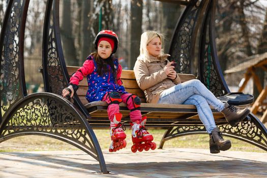 Little girl offended because of her mother does not pay attention to her and using smartphone