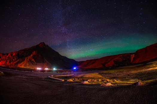 Iceland Aurora and Mountain Silhouette. Shooting Location: Iceland, Lay Cavik