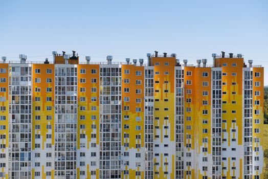 Image of front view of big building with appartements and shadows