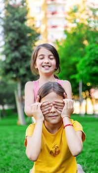 girlfriends children hugging in the park.selective focus.kids