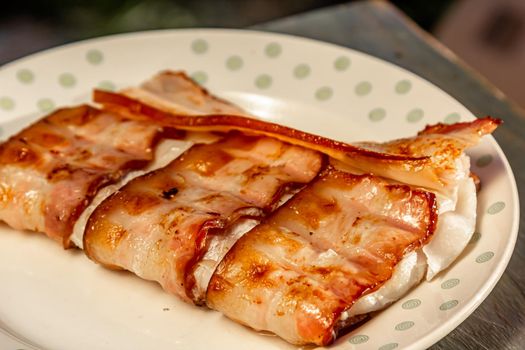 Cod fish wrapped in bacon.