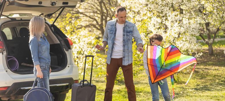 asian muslim family with suitcase prepare to go. concept of family travelling.