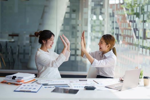 Business Success concept with partner, Partnership Giving Fist Bump after Complete a deal. Successful Teamwork, Businessman with Team Agreement in Corporate