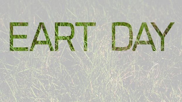 The word Earth Day with green grass inside the letters. Earth day concept.