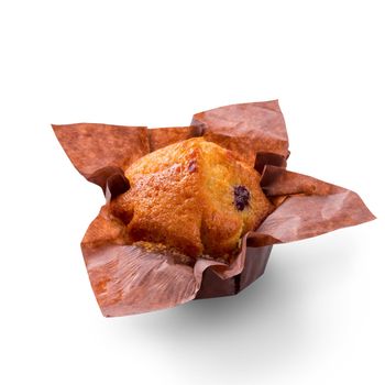 Delicious muffin on white background. Fresh cakes in decorative paper. Copy space to place text, close up