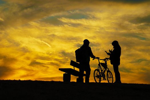 People standing on the hill at dusk. Shooting Location: Mitaka City, Tokyo