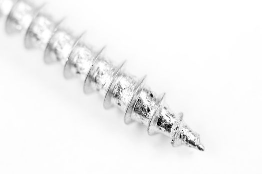 Macro photography of external screw thread on white background