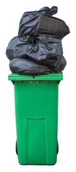 A Green Wheelie Bin, Overflowing With Bin Bags (Trash), Isolated On A White Background