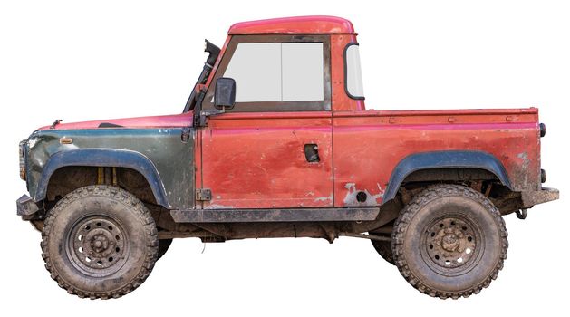 An Isolated Endurance 4x4 Off-Road Truck Covered In dirt And Scratches
