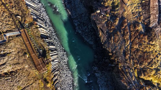 Drone view of iron viewpoint on top of the basaltic canyon with green river
