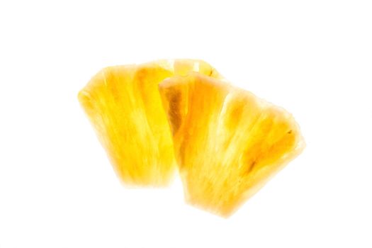 Pineapple chunks isolated on white background. Slices. Slose-up. Copy space