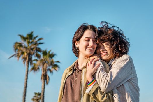 interracial female couple of homosexual young women in love, concept of tolerance and racial diversity