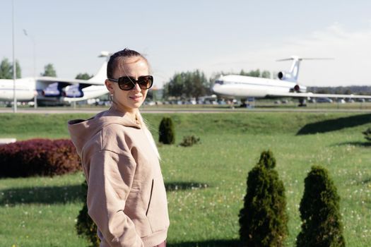 close-up. woman standing in an open area at the airport.