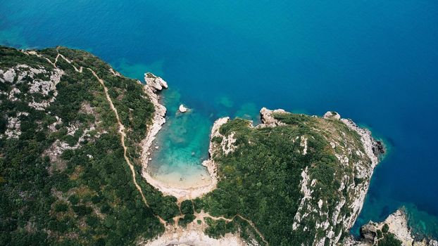 Aerial view of Porto Timoni beach and pirate bay on Corfu island in Greece. Ionian sea.