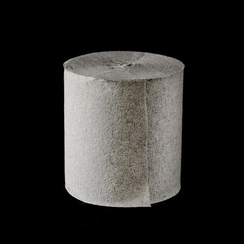 Roll of toilet paper, on black background isolated