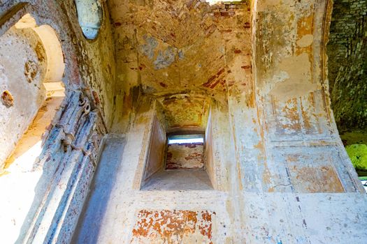 Interior of an ancient ruined temple. Bottom up view.