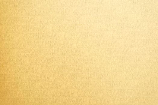 A light yellow wall texture abstract background.