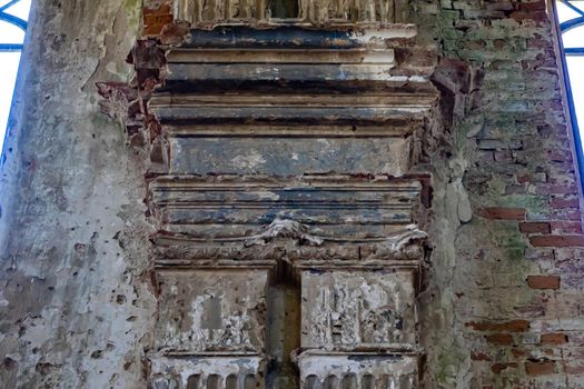 The upper part of the column in the interior of an ancient building.