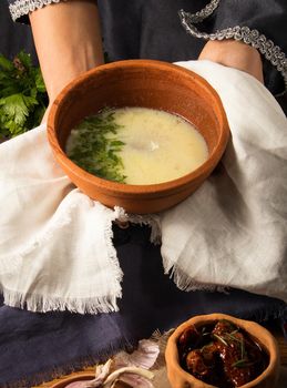 A shot of a dish in hands