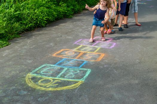 Children play classics on the street. Selective focus. Kids.