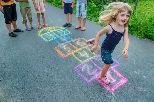 Children play classics on the street. Selective focus. Kids.