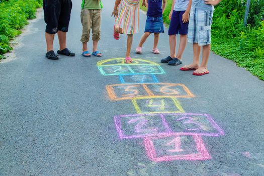 Children play classics on the street. Selective focus. Kids.