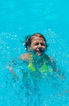 The child is drowning in water. Selective focus. Kid.