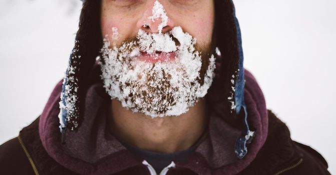 Frozen snow on the beard.