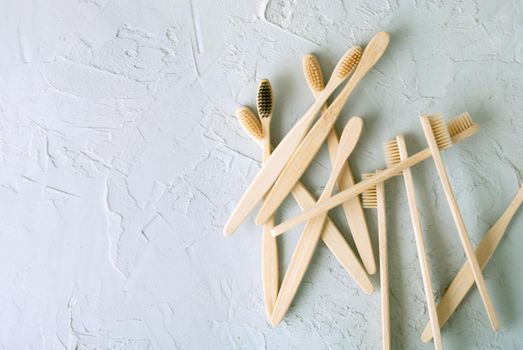 bamboo toothbrushes on a concrete background with copy space. High quality photo