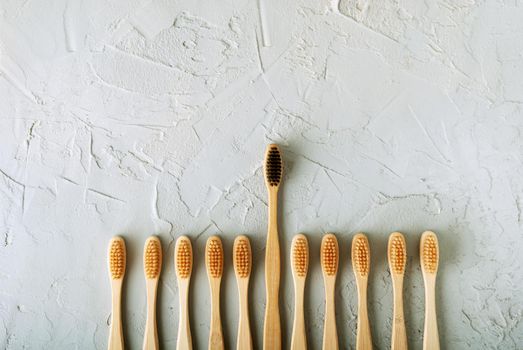 bamboo toothbrushes on a concrete background with copy space. High quality photo