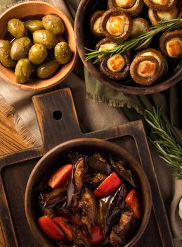 A top view shot of eggplant salads and mushrooms