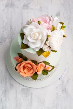 A vertical shot of a flower designed cake from top view