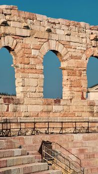 Verona, Italy - March 19, 2022: Beautiful photography of the Arena at Piazza Brà in Verona, a famous Roman amphitheater. Macro view of the old construction by day.