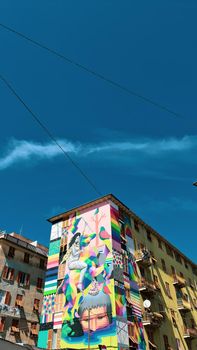 Genova, Italy-January 29, 2022: Beautiful modern high-rise buildings against the sky. 3d illustration on the theme of business success and technology. clouds reflection on the mirror.Industrial zone.