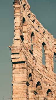 Verona, Italy - March 19, 2022: Beautiful photography of the Arena at Piazza Brà in Verona, a famous Roman amphitheater. Macro view of the old construction by day.