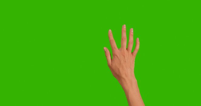 Gestures pack. Female hand touching, clicking, tapping, sliding, dragging and swiping on chroma key green screen background. Using a smartphone, tablet pc or a touchscreen.