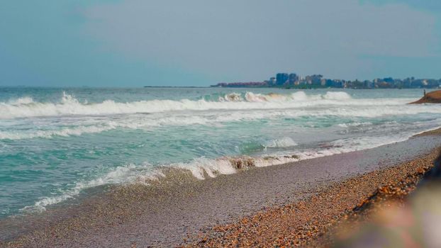 Close up sea, ocean waves. View from Seashore, blue sky, summer landscape at the sea. Blue, clear water