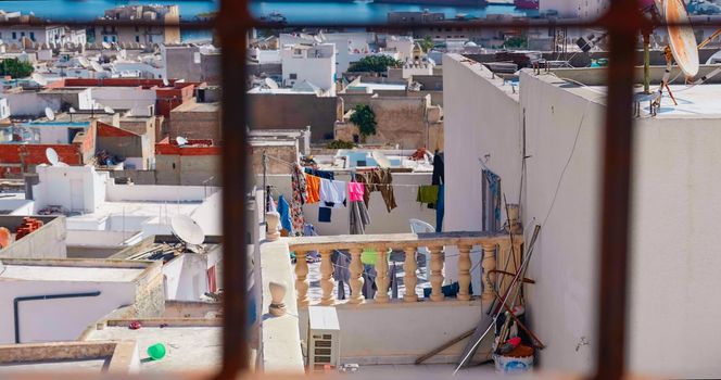 Sousse Port, Tunisia. City building. Port area with buildings, houses, cargo warehouses.