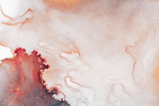 Burning abstract background from marble ink art of exquisite original painting . Painting was painted on high quality paper texture to create smooth marble background pattern of ombre alcohol ink .