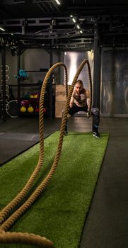 Rope man grass warehouse green fitness training gym exercising exercise, for athlete one from male from healthy moving, sport muscle. Standing ground holding, lifestyles