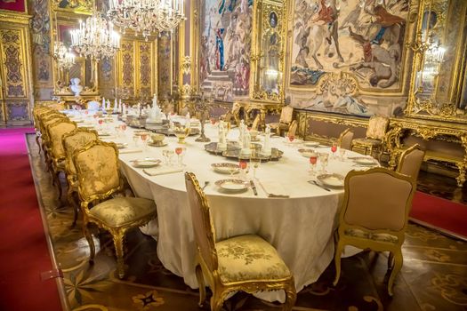 VENARIA REALE, ITALY - CIRCA AUGUST 2020: luxury dining room in Baroque style  with gala dinner table setting