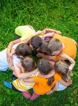 Children are playing with their hands clasped together. Selective focus. Kids.