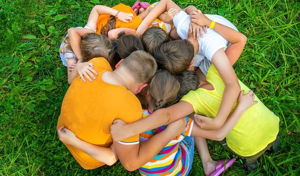 Children are playing with their hands clasped together. Selective focus. Kids.