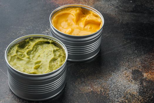 Canned cheese and guacamole sauce in can