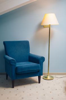 lamp light with chair on blue background
