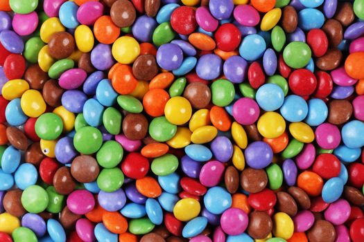 A multi coloured halloween candy sweet close up background