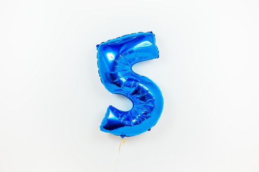 number five 5 blue balloon, isolated on white