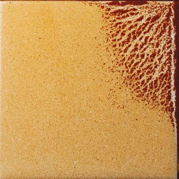 abstract wet rust scattering on a tile background