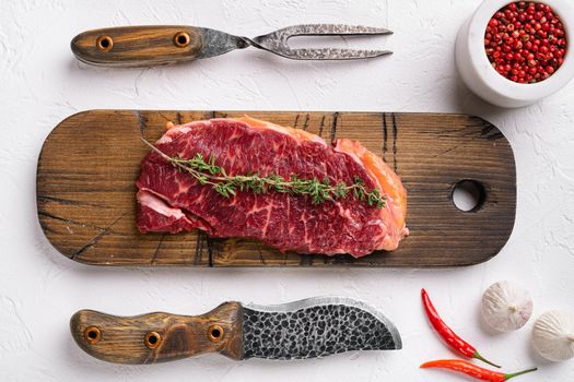 Meat steak set, on white stone table background, top view flat lay