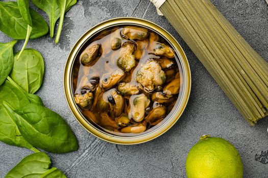 Seafood appetizer fresh mussels marinated set, on gray stone table background, top view flat lay